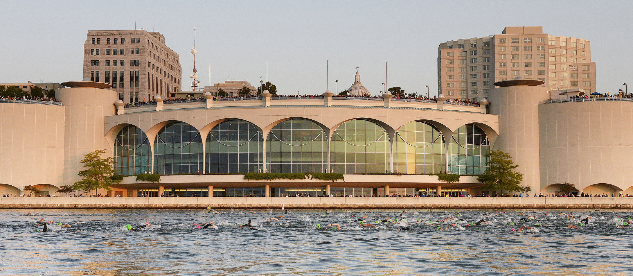 Swimmers pass Monona Terrace
